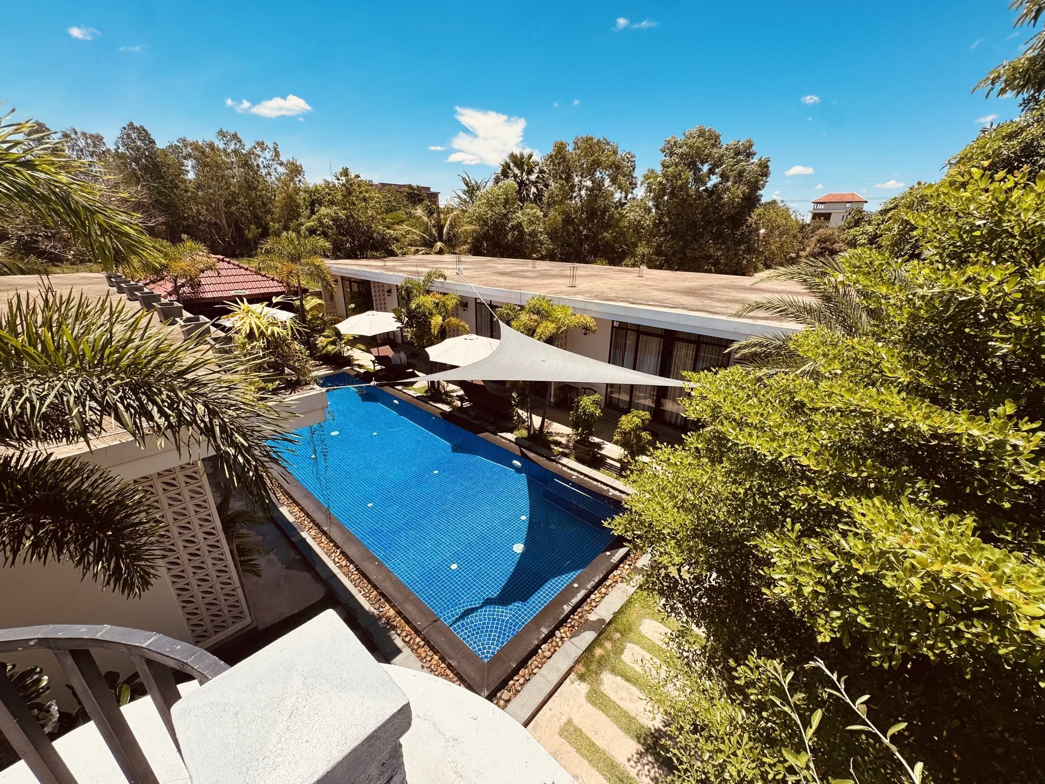 Enchanted Pool Bungalows surrounding their shared swimming pool